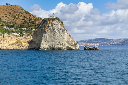Scenic view of Capo Miseno and its lighthouse that marks the northwestern limit of the Gulf of Naples, Italy
