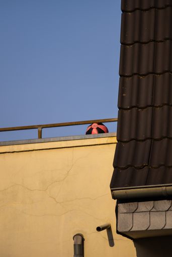 A vertical shot of a house roof