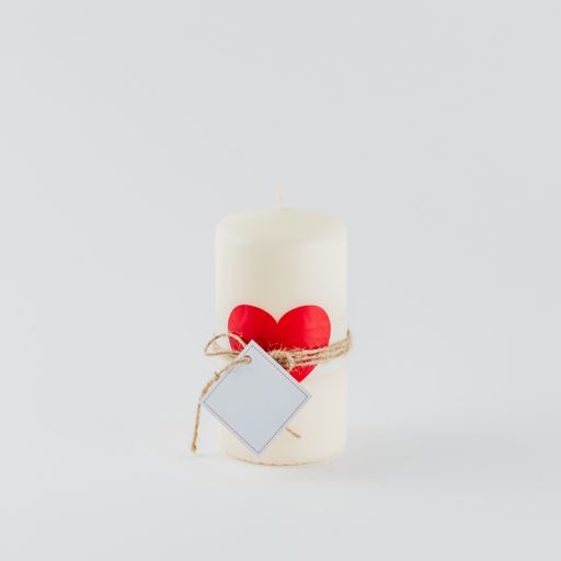 A closeup shot of Valentine's day decorations on a white background
