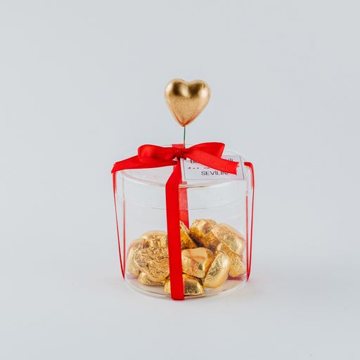 A closeup shot of Valentine's day decorations on a white background