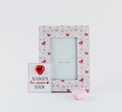 A closeup shot of Valentine's day decorations on a white background