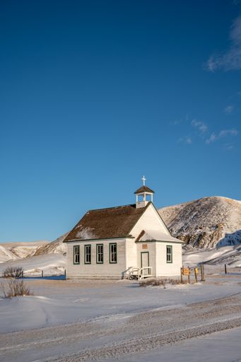 Winter at the old wooden pioneer church in the ghost town of Dorothy in Alberta, Canada