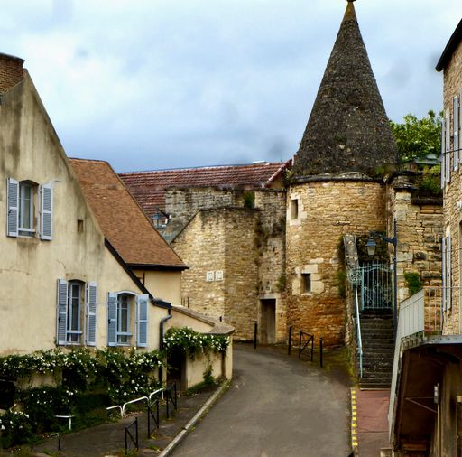 A beautiful view of the small castle building on a gloomy day in Beaune, France