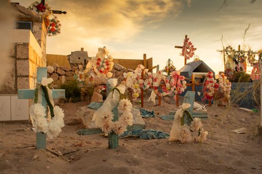 A beautiful picture of a burial ceremony with flowers under the great sky