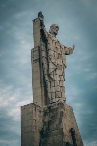A vertical low angle shot of Sagrado Corazon Constante Monument in Spain