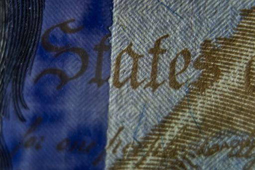 The closeup of a one hundred dollars bill