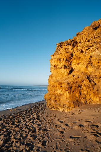 A scenic rocky beach on a sunny day