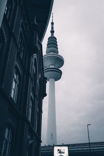 A vertical shot of the TV tower in Hamburg during a cloudy day
