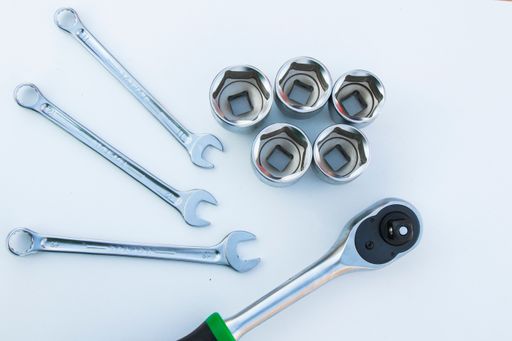 A professional kit of a large group of different metal wrenches.