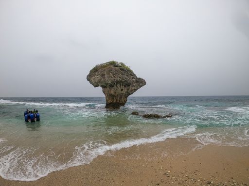 A beautiful view of a rock in the ocean