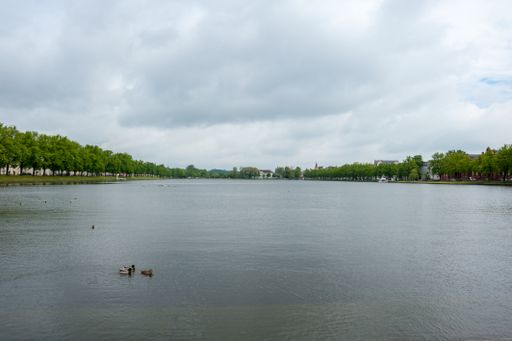 Schwerin, Germany - May 10, 2014: View at Pfaffenteich, Pfaffenpond, from staircase at southern bank at overcast day in Schwerin, Germany