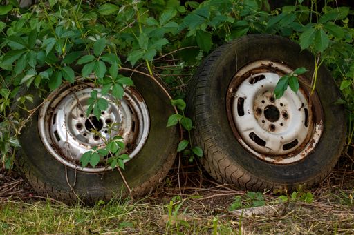A closeup shot of two old tires in the nature