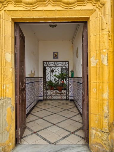 A vertical shot of an open door entrance.