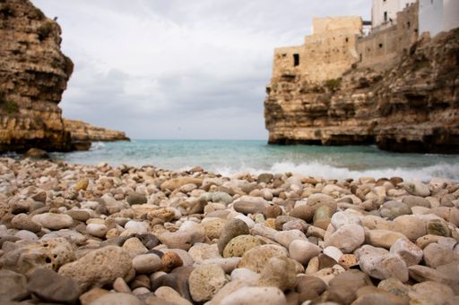The old buildings on the shore. Lama Monachile, Polignano a Mare, Italy.