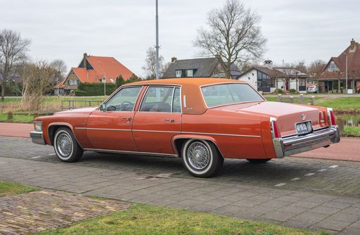 A closeup of a Vintage luxury car Cadillac Sedan de Ville manufactured in year 1977