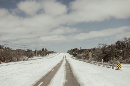 A beautiful shot of a ranch covered in snow in winter