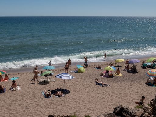 A nudist beach on the costa brava a sunny summer day in Spain