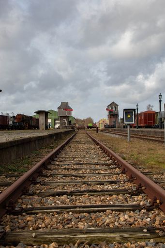 A vertical shot of abandoned train rails