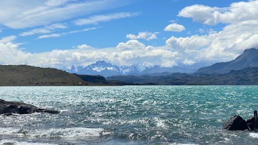 A beautiful shot of a lake surrounded by mountains