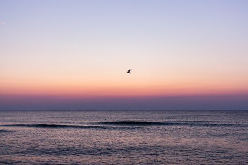 A beautiful sunset over a wavy lake