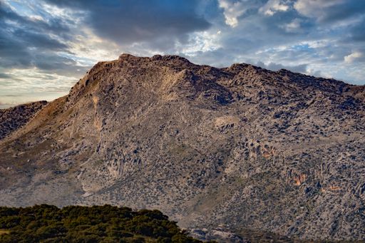 mountain scenery with cloudy sky at sunset