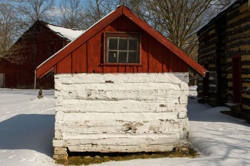 A small wooden house during winter