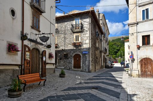 A view of narrow street among the stone buildings of Pescocostanzo