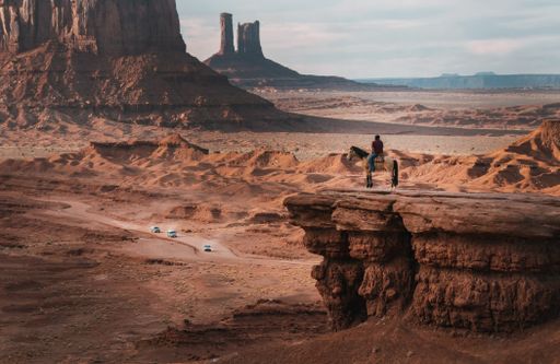 Man on a horse standing on a rock