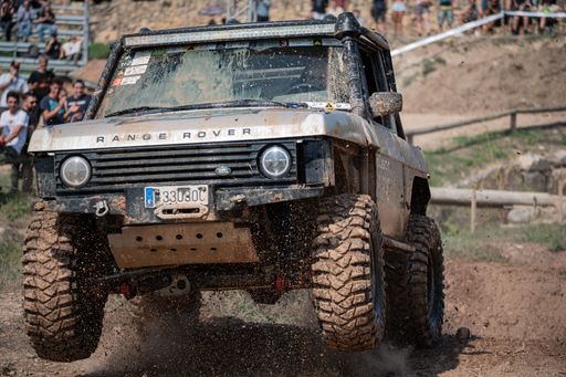 Barcelona, Spain, August 12, 2021: Gray Land Rover Range Rover Classic Bobtail jumping on a trial