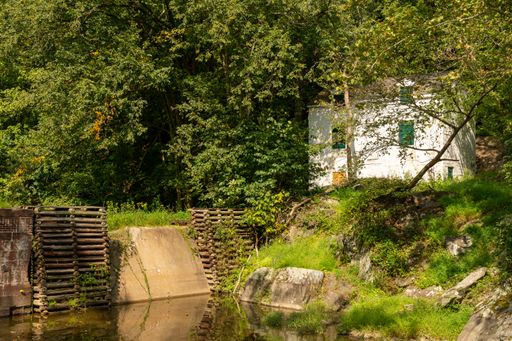 An old canal lock house in disrepair along the Chesapeake and Ohio Canal Towpath