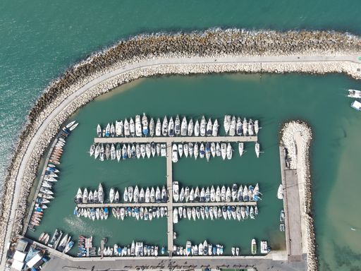 A bird's eye view shot of harbor sea boats, ships