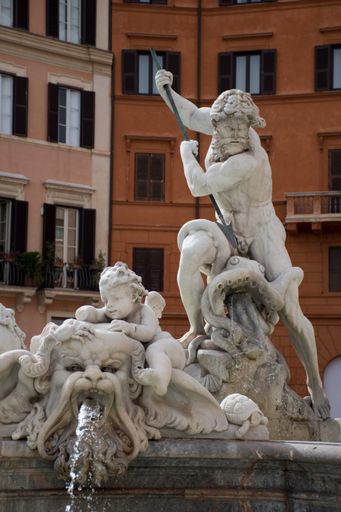 A vertical shot of the Fountain of Neptune in Rome