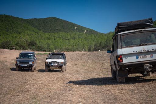 A shot of the three Range Rover Classic cars on a trip through the mountains in Suria, Spain