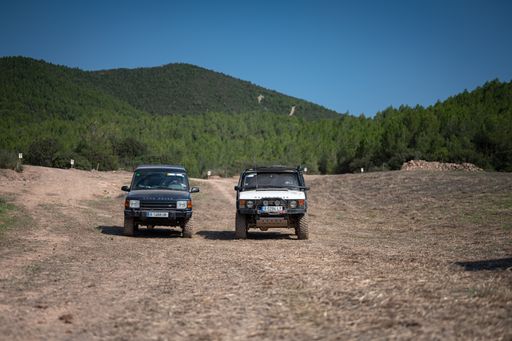 A shot of the two Range Rover Classic cars on a trip through the mountains in Suria, Spain