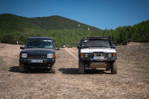 A shot of the two Range Rover Classic cars on a trip through the mountains in Suria, Spain