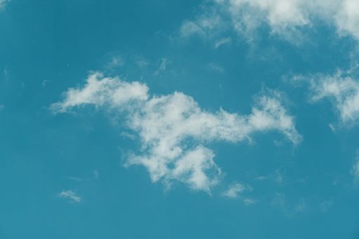 A landscape shot of the clear blue sky with some clouds