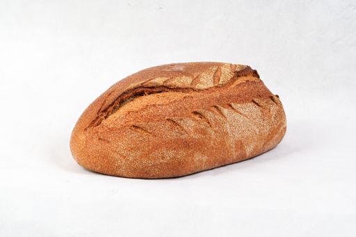 A closeup shot of the farro and spelt whole bread isolated on the white background