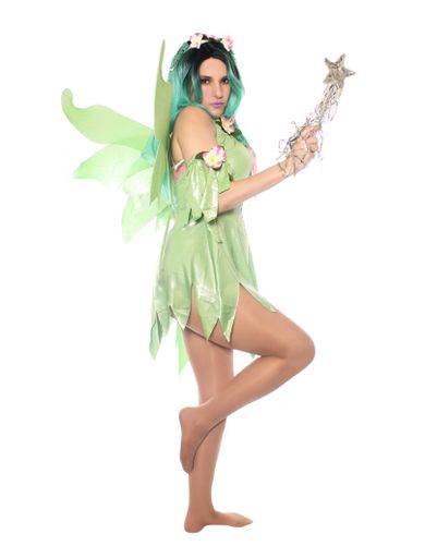 A vertical shot of a woman wearing a green fairy costume isolated on white background