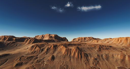 A desert landscape with blue sky on the background