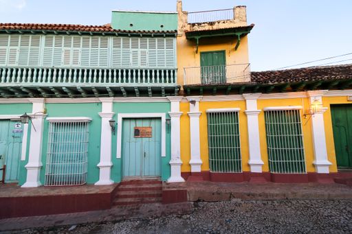 A beautiful view of a colored building in Trinidad under the blue sky