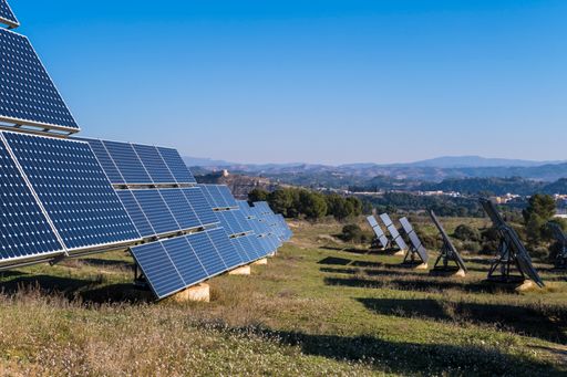 The solar cells in the field against a sky