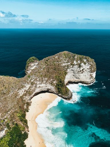 A beautiful landscape Aerial view of cliffs and forest trees in the turquoise water