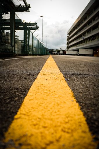A vertical shot of an empty street in the city