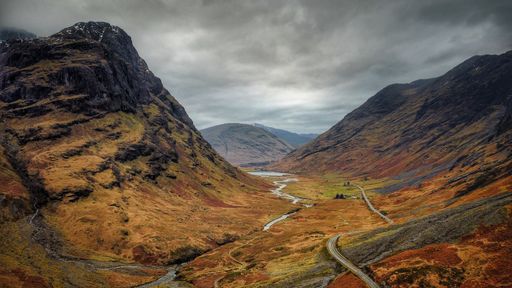 A beautiful shot of highlands in Scotland under the cloudy skies