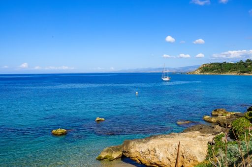 A beautiful shot of the sea from the beach on a sunny day