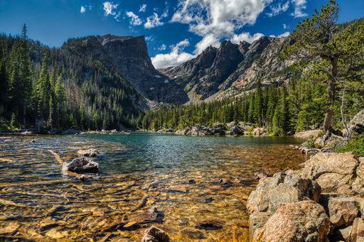 A scenic view of Dream Lake at Rocky Mountain National Park, Colorado, USA on a sunny day
