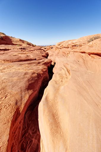 A vertical closeup shot of the pink Antelope Canyon on Navajo land, Arizona, United States