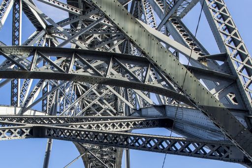 A closeup shot of the metalworks of famous Dom Luis I Bridge in Porto, Portugal