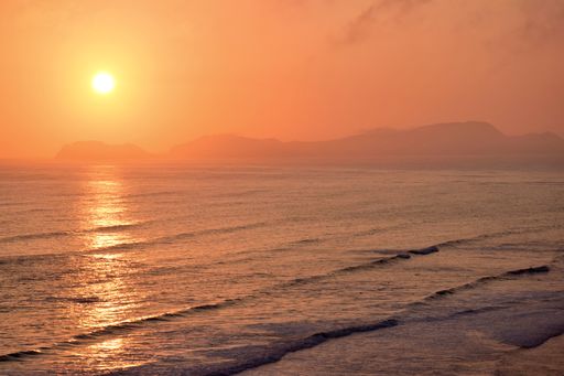 Beautiful scene at sunset by the Ocean in Lima, Peru
