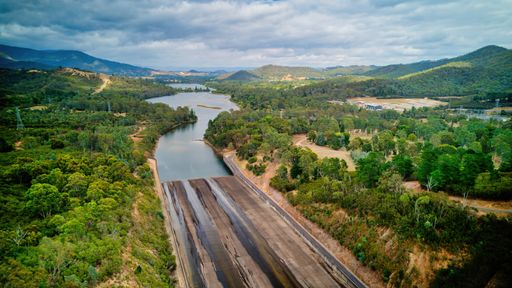 An aerial view of the Lake Eildon hydroelectric infrastructure dam and surrounds